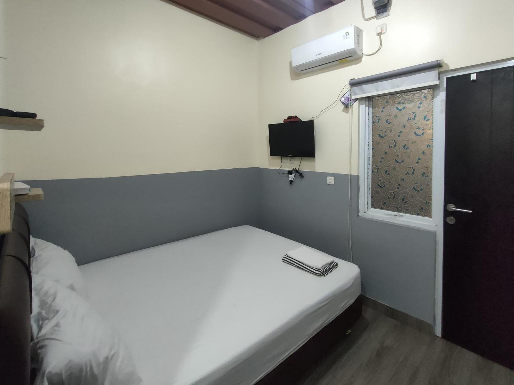 Puspiptek Residence Syariah Mitra Reddoorz Serpong Extérieur photo